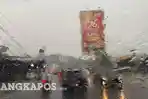 20260615-HUJAN-LEBAT-Suasana-jalanan-di-Kota-Pangkalpinang-saat-hujan-lebat-mengguyur.jpg