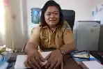 kepala-dinkes-sitaro-dr-ria-papalapu-mkes.jpg