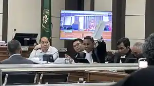 20260704_Hotman-Paris-sidang-korupsi-PT-Sritex-di-Pengadilan-Tipikor-Semarang_1.jpg