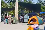 Tren Piknik Lebaran di Ancol: Warga Bawa Tenda Sendiri Demi Hemat Biaya