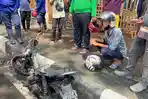 Motor-milik-Anang-tampak-gosong-setelah-terbakar-usai-mengantar-penumpang.jpg