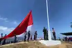 PENGIBARAN-BENDERA-Bendera-merah-putih-raksasa-berukuran-9x6-meter-berhasil.jpg