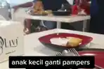 Ibu-Nekat-Ganti-Popok-Anak-di-Atas-Meja-Makan-Restoran.jpg