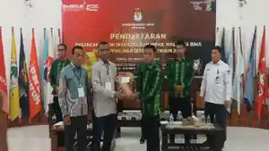 Pasangan-H-Syafriansar-dan-Syamsudin-mendaftarkan-656.jpg