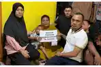 2026-05-08-Andi-Tenriawaru-jilbab-hitam-didampingi-Camat-Tanete-Riattang-Timur.jpg
