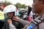 Pembagian Helm Gratis Kepada Pemudik