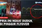Diduga-Ada-Masalah-dengan-Pacar-Seorang-Pria-Nekat-Duduk-di-Pinggir-Flyover.jpg