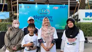 Ibu-Eka-Warni-nasabah-PNM-Mekaar-asal-Tangerang-ikut-Mudik-Bareng-BUMN.jpg