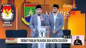 Robinsar-dan-Fajar-saat-debat.jpg
