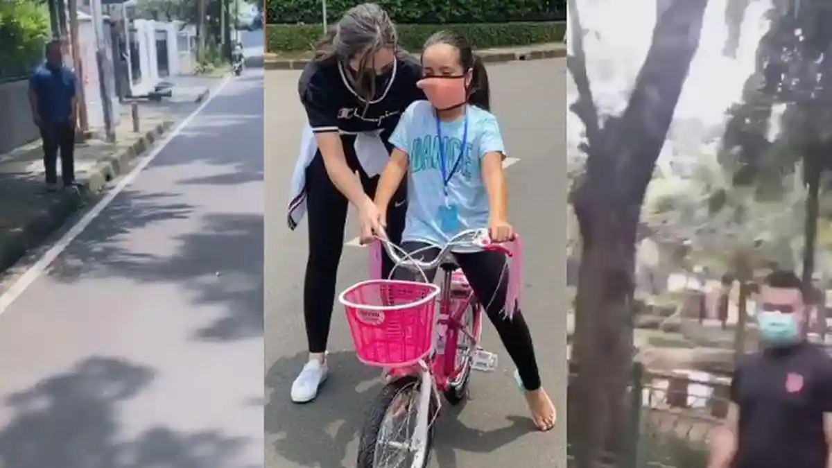 Nia Ramadhani dan sang Anak Sepedaan dengan Dikawal Bodyguard