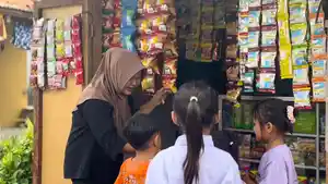 Marni-penerima-manfaaat-HOME-Syariah.jpg