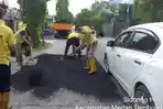 Dinas-PU-Perbaiki-Jalan-di-Medan.jpg