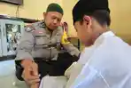 Aipda-Nasaruddin-Hasibuan-pagi-jadi-polisi-sore-jadi-guru-ngaji.jpg