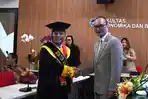 Erwan-Rachmat-menyandang-gelar-doktor.jpg