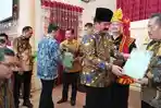 Menteri-ATRBPN-tebar-pesona.jpg