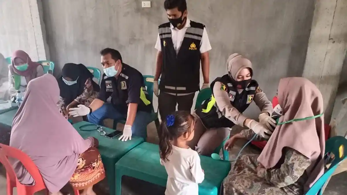 Polres Lhokseumawe Adakan Pengobatan Gratis kepada Warga Terdampak Banjir di Aceh Utara