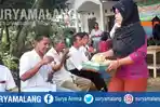 jemaat-gereja-pantekosta-di-indonesia-gpdi-boyolangu-dijamu-ketupat-sayur-oleh-umat-islam_20170702_102502.jpg