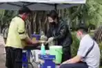 Warung Nasi Kuning Berbagi Berkah Saat Pandemi Covid-19
