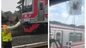 INSIDEN-PELEMPARAN-BATU-Kaca-di-rangkaian-kereta-retak-akibat-tindakan-pelemparan-batu.jpg