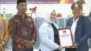Syah-Afandin-Tiorita-Br-Surbakti_KPU-Langkat_.jpg
