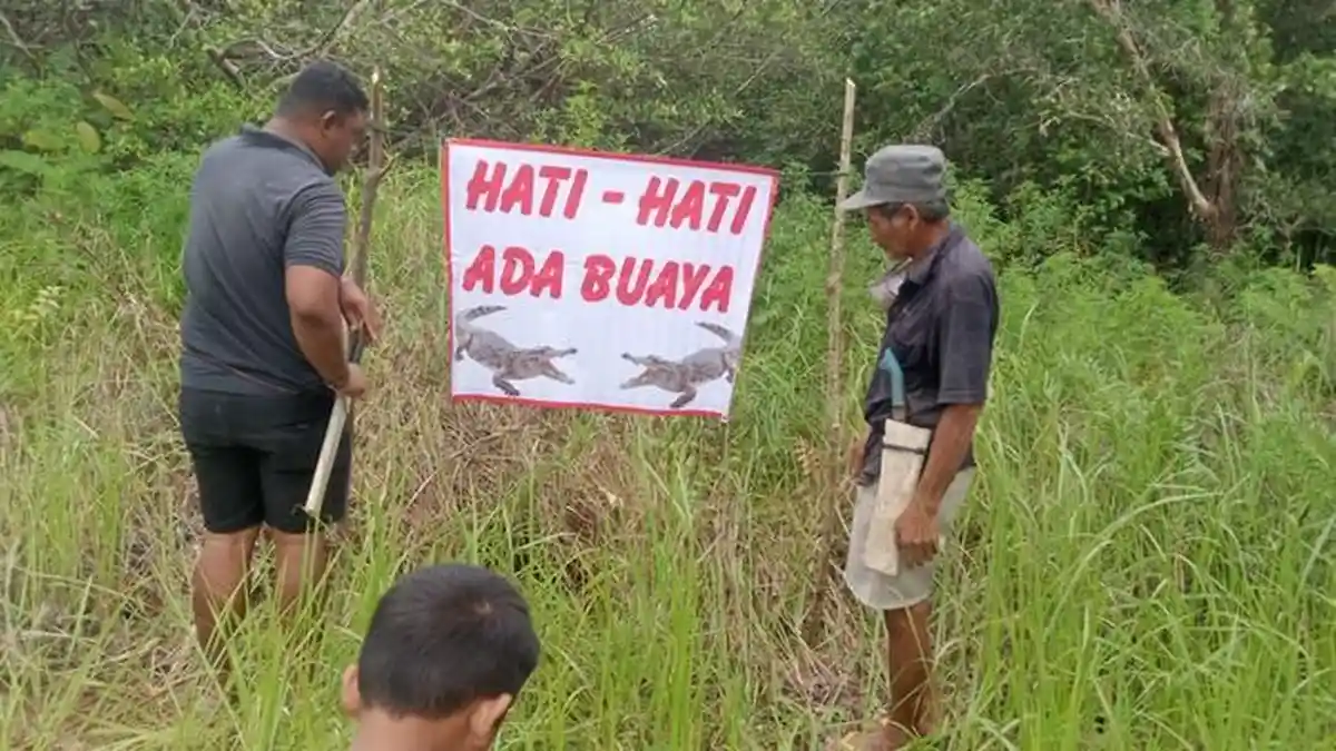 Diduga Sarang Buaya, Pemdes Tanjung Rusa Belitung Pasang Plang Imbauan Waspada