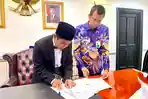 Bank-Aceh-Syariah-Teken-MoU-dengan-Kemenhaj-RI.jpg