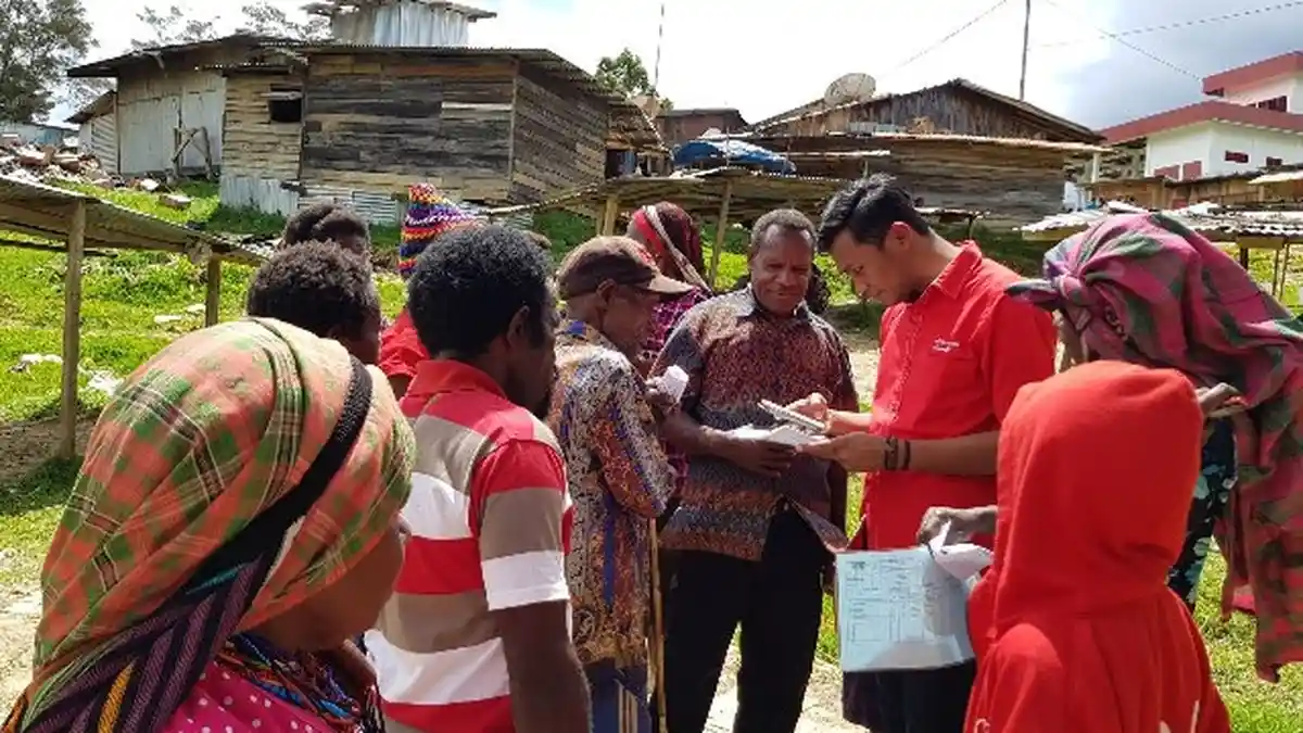 Telkomsel Turunkan Tim Registrasi hingga Daerah Pegunungan Papua