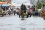 Rob Genangi Jalan Dermaga Muara Angke
