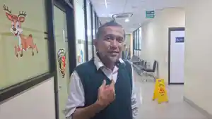 BULLYING-Ketua-KPAD-Kota-Bekasi-Novrian-saat-ditemui-di-Polres-Metro-Bekasi-Kota.jpg