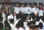presiden-jokowi-pimpin-apel-hari-santri-2023-di-tugu-pahlawan-su_20231023_103644.jpg