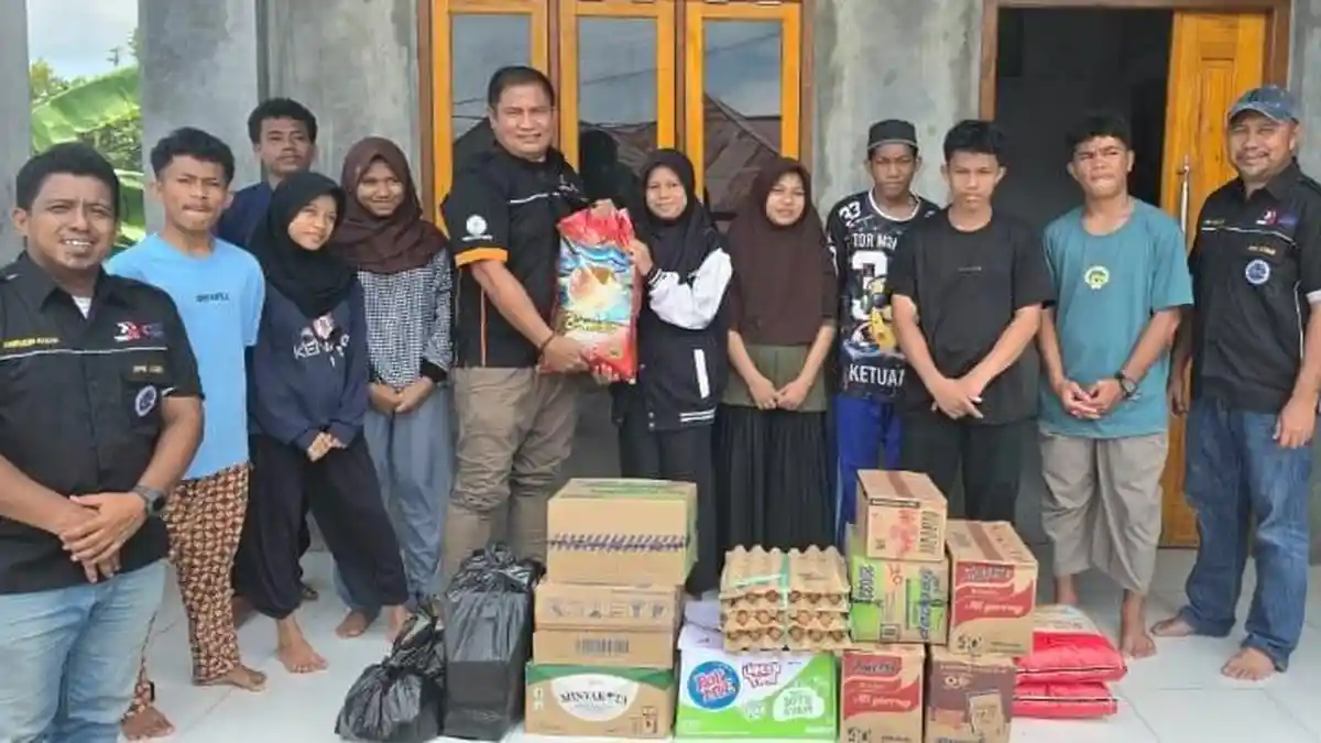 Milad ke 15, DPK FPE PT NHM Berbagi kepada Anak Yatim dan Yatim Piatu di Ternate