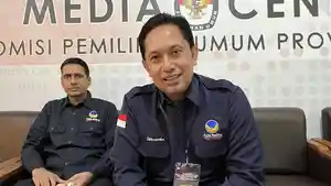 Sekretaris-DPW-NasDem-Bali-I-Nyoman-Winatha-kanan.jpg