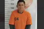 tersangka-penusukan-AH-yang-kini-telah-ditahan-di-Polsek-Pelaihari.jpg