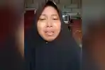 Seorang-ibu-menangis-meminta-keadilan-atas-peristiwaS.jpg