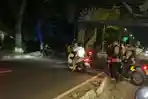 Petugas-gabungan-saat-mengamankan-tujuh-remaja-diduga-terlibat-balap-liar-di-cipayung.jpg