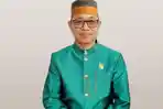 rektor-Unkhair-Ternate-Ridha-Ajam-anggota-Dewan-Pendidikan-Tinggi.jpg