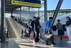 Penumpang-menuju-gerbong-kereta-keberangkatan-dari-Stasiun-Malang.jpg