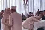 PENGANTIN-Pria-Nangis-Sesenggukan-Usai-Akad-15-Tahun-Pacaran-Akhirnya-Bisa-Nikahi-Pujaan-Hati.jpg