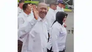 Bupati-Kabupaten-Langkat-Syah-Afandin-atau-Ondim-bersama-Tiorita-Surbakti.jpg