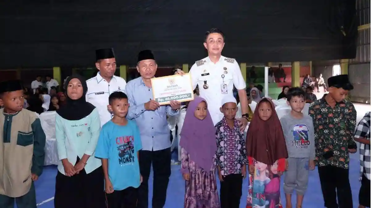 Pj Bupati Muaro Jambi Serahkan Bantuan pada Masyarakat 