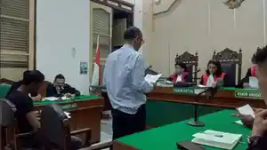 Wakil-Rektor-Universitas-Darma-Agung-Yudi-Saputra-dan-Nanda.jpg