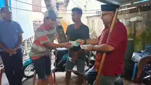 20230328_Muhammad-Sanusi-Rahaningmas-menyerahkan-bantuan.jpg