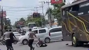 polisi-terlindas-bus.jpg
