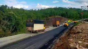 Terbaru-Jalan-lintas-Riau-Sumbar-di-Desa-Tanjung-Alai-mulai-diaspal.jpg