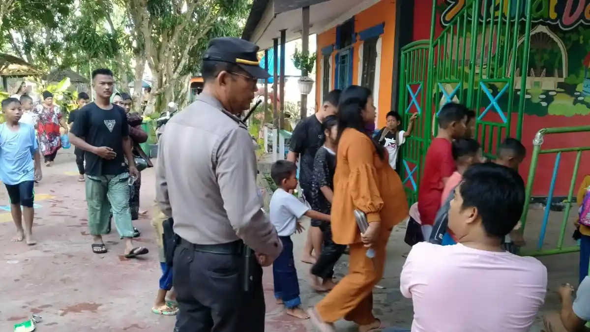 Polres Tanjung Balai Pastikan Keamanan Masyarakat saat Libur Lebaran di Objek Wisata Kolam Renang