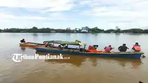 20230514-Tim-SAR-Gabungan-Berupaya-Mencari-Anggota-Parpol-yang-Nekat-Terjun-ke-Sungai-Kapuas.jpg