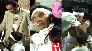 Desta-Mahendra-menenangkan-anaknya-yang-sedih.jpg