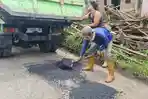 perbaikan-jalan-rusak-aplikasi-jalan-cantik.jpg