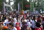 20140628_112900_pendukung-jokowi-jk-menyesaki-arena-car-free-day-dago-di-kota-bandung.jpg