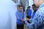 asn-hss-diberi-hand-sanitizer-sebelum-memeasuki-ruan-n-covid-19-beberapa-waktu-lalu.jpg